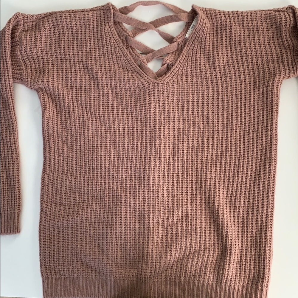 rosy pink sweater with tied up back